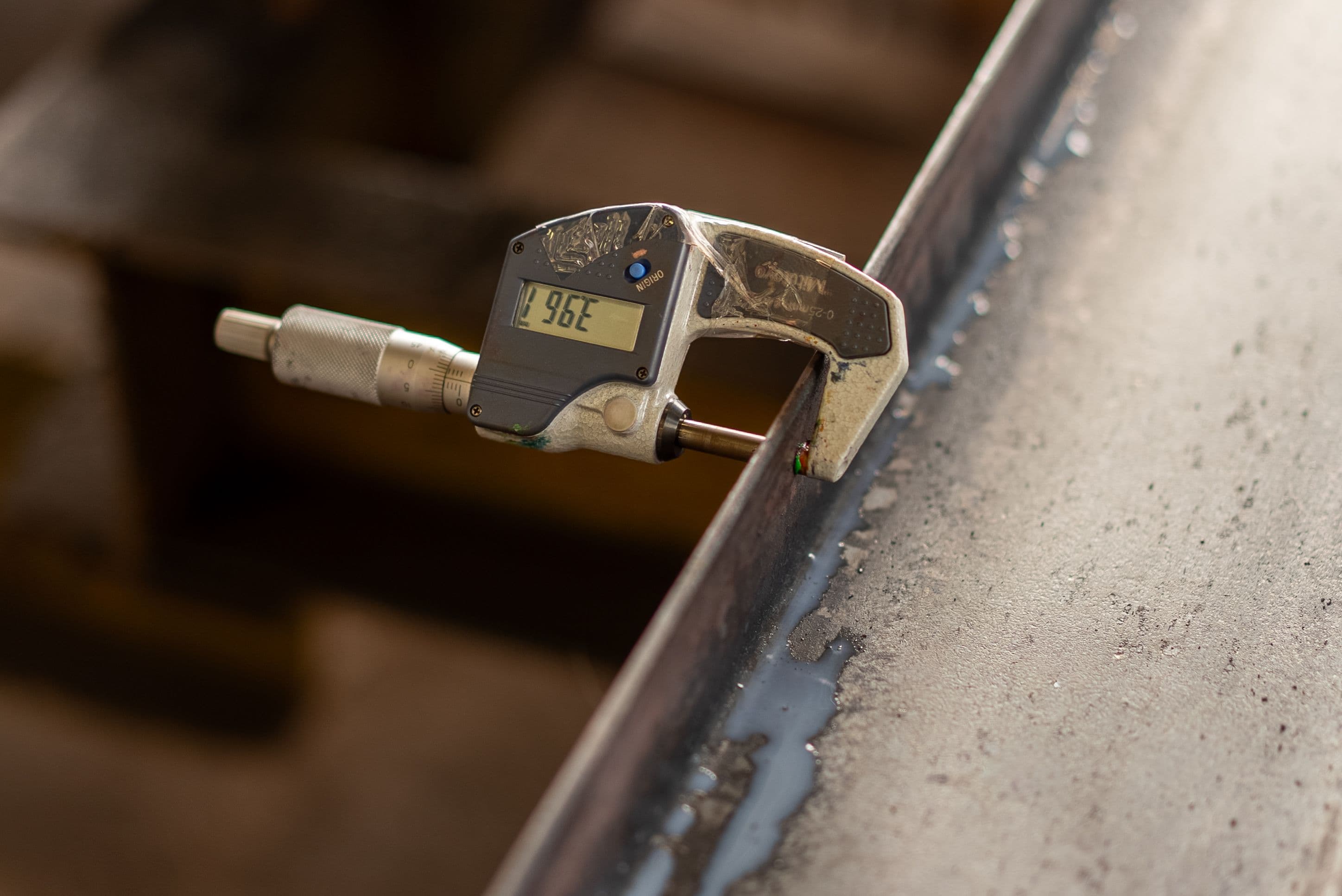 Measuring metal with a micrometer